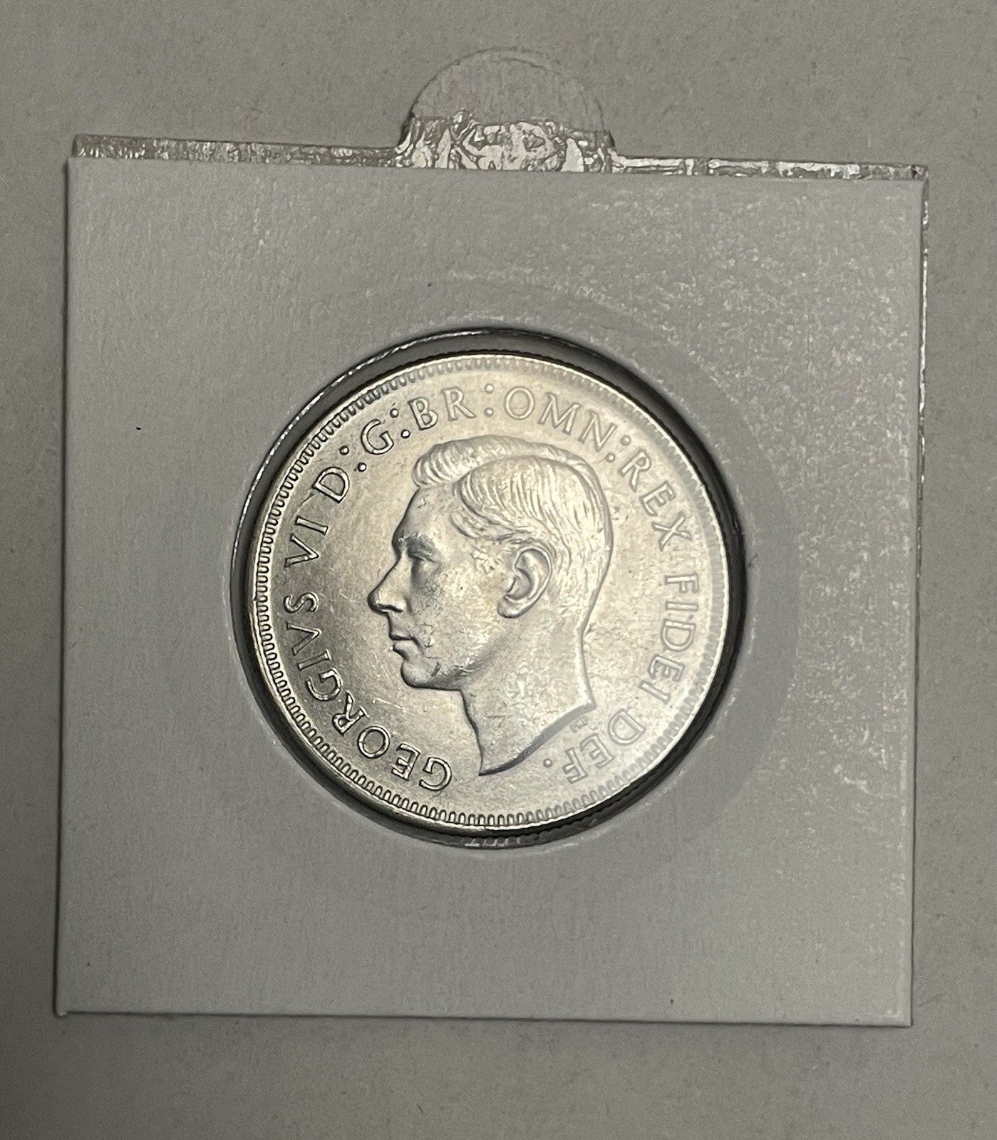 6957758