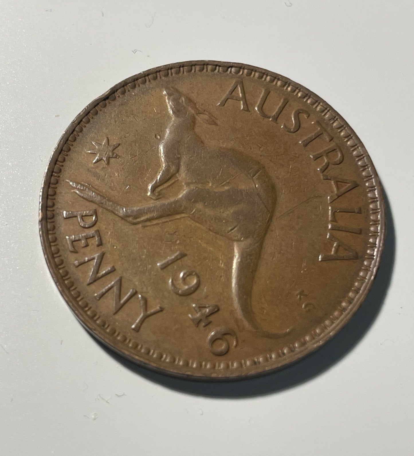 7077842