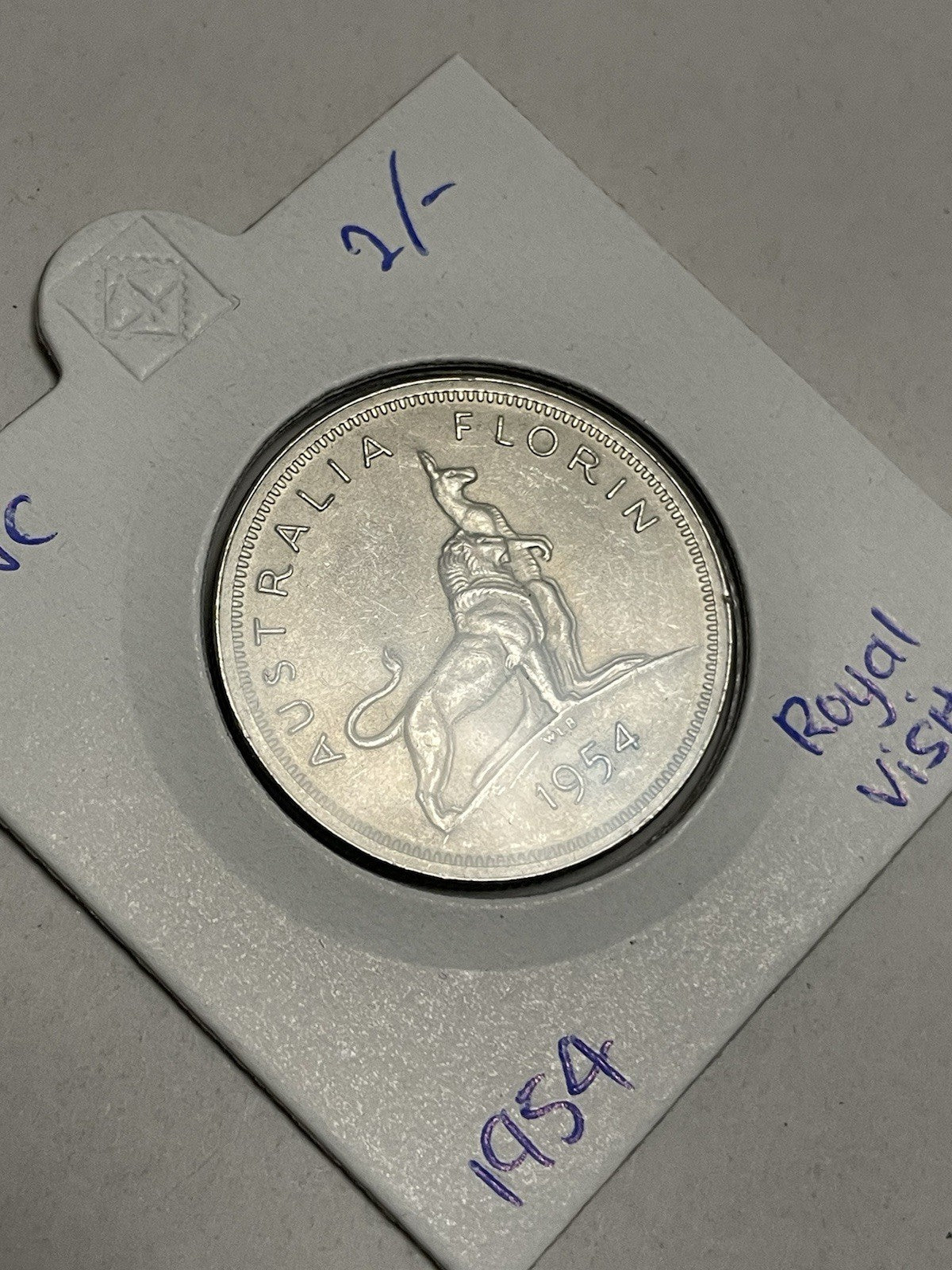 6957756
