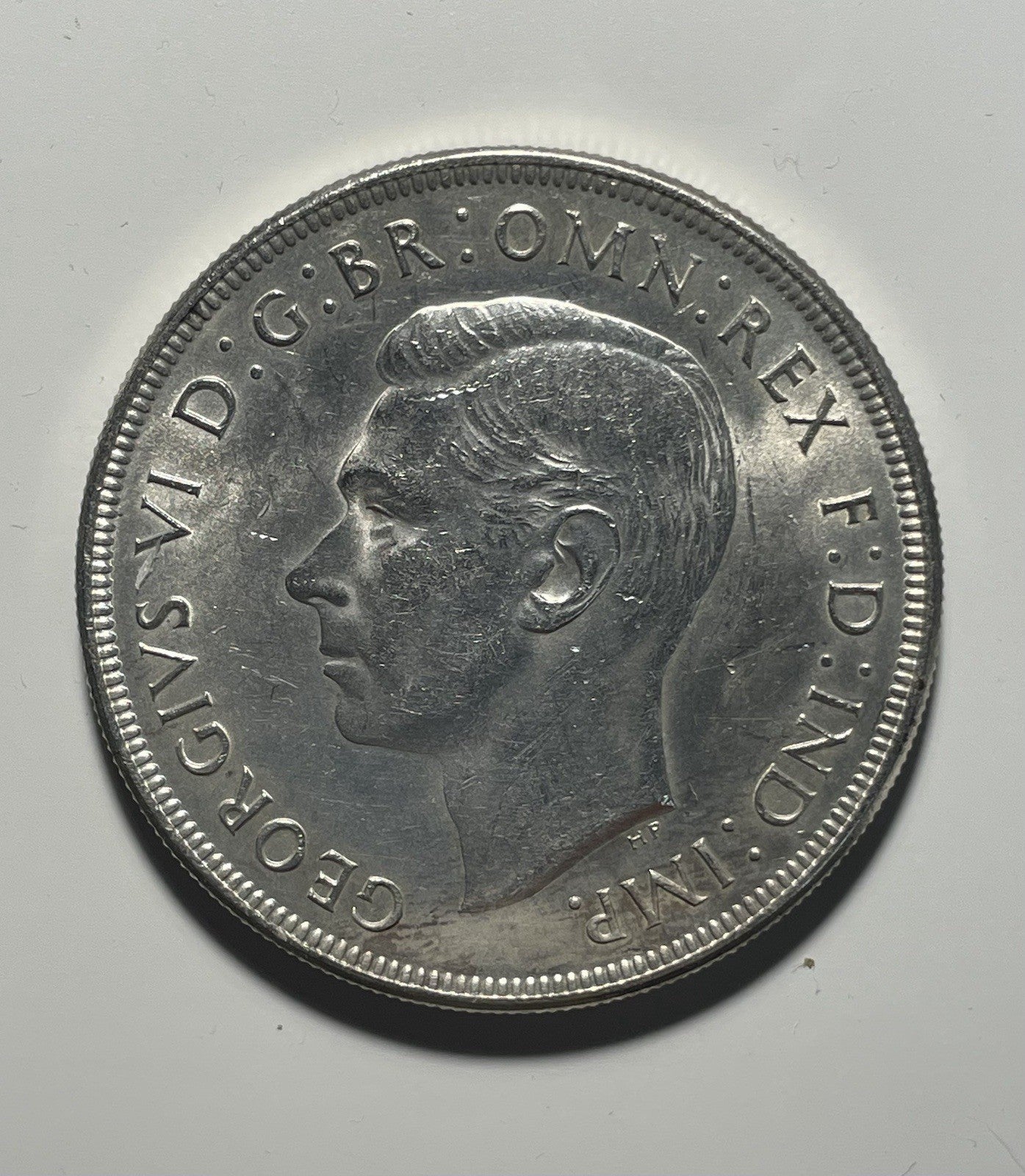 7700603