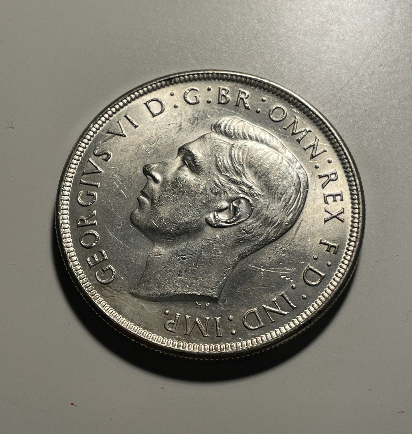 7700603