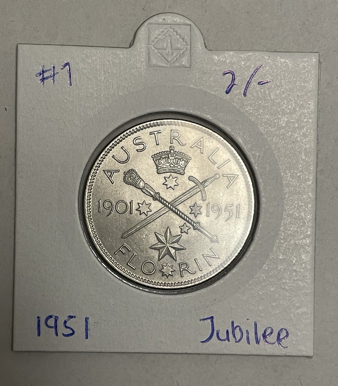 6957758