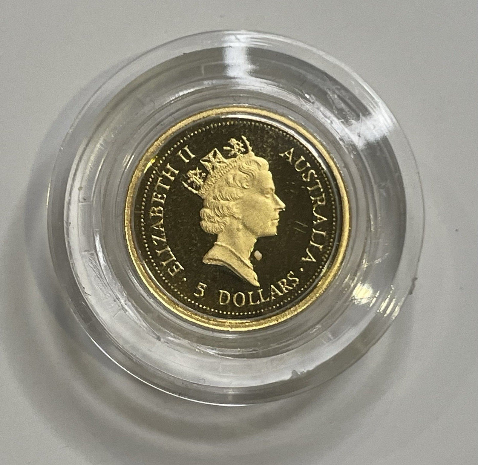 6957775
