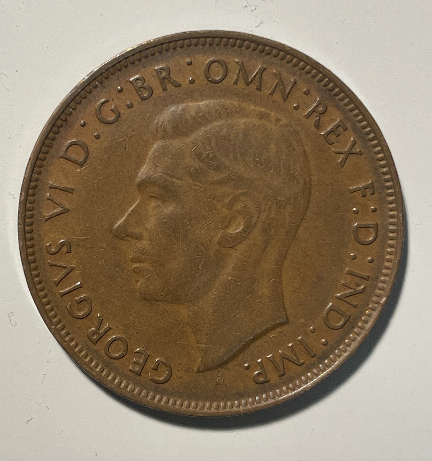 7077842