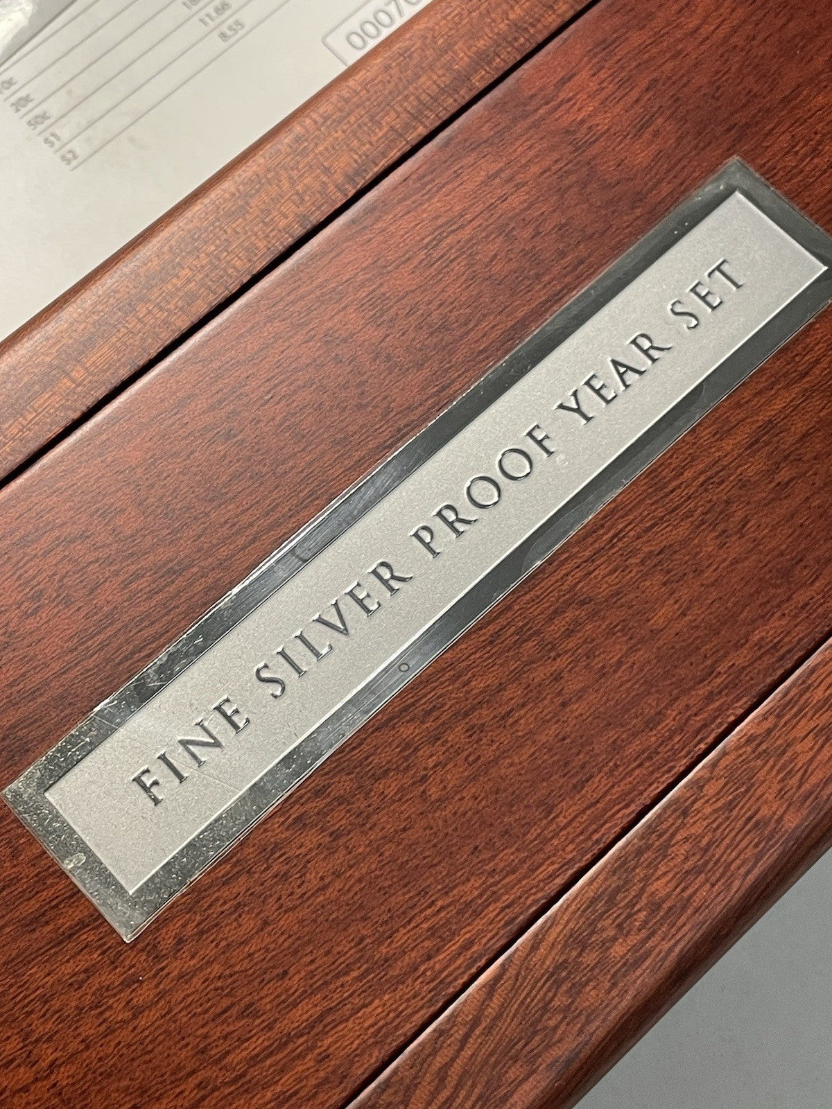 7635893