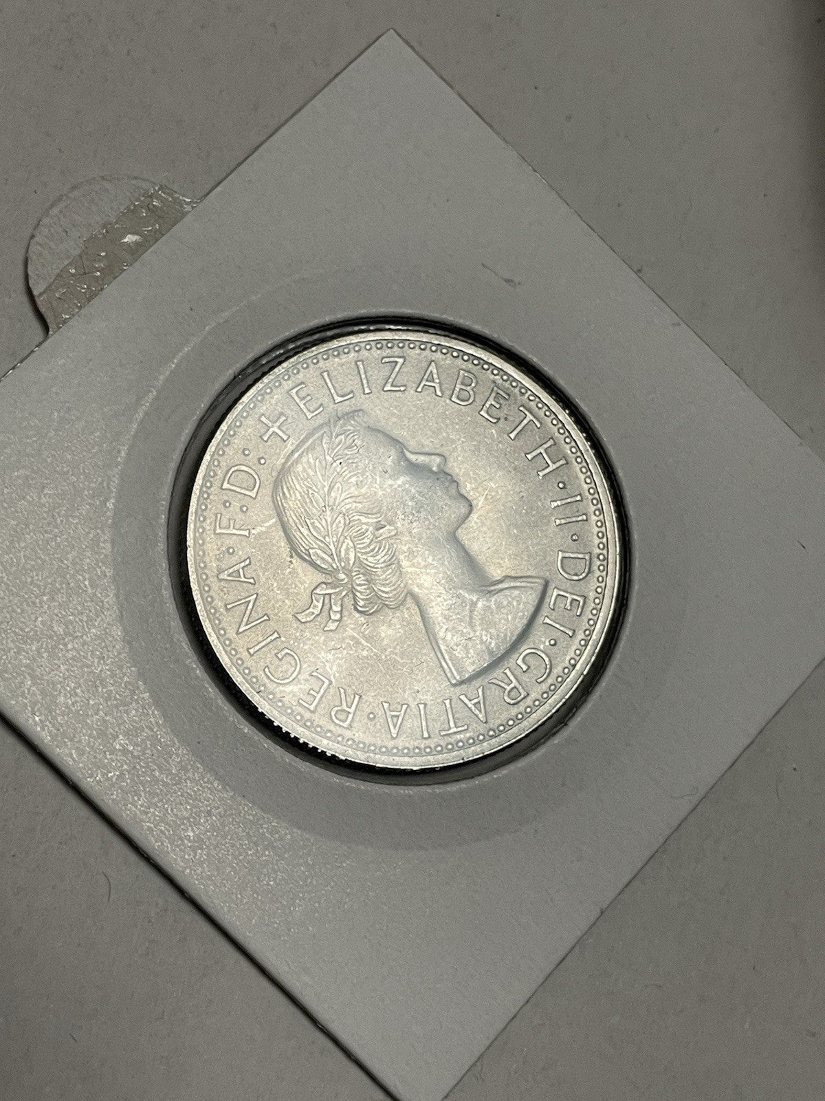 6957756