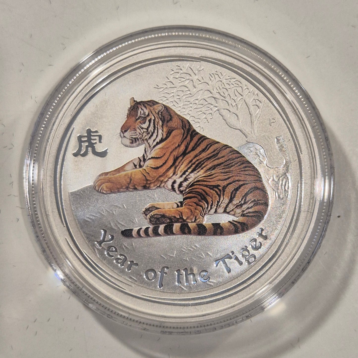 2000 Dragon proof 1oz, 2014 Horse coloured proof 1oz, 2010 Tiger coloured 1oz