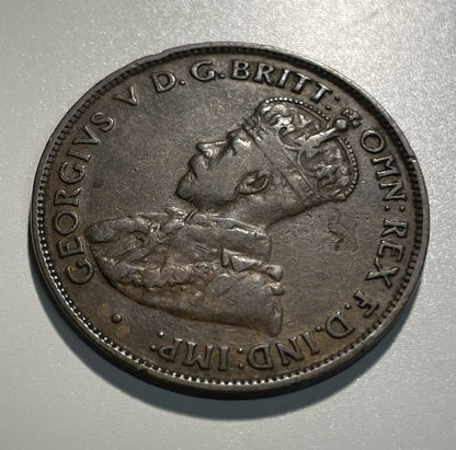 6957774