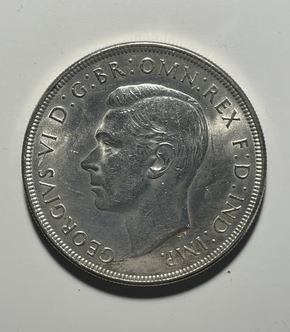 7700603