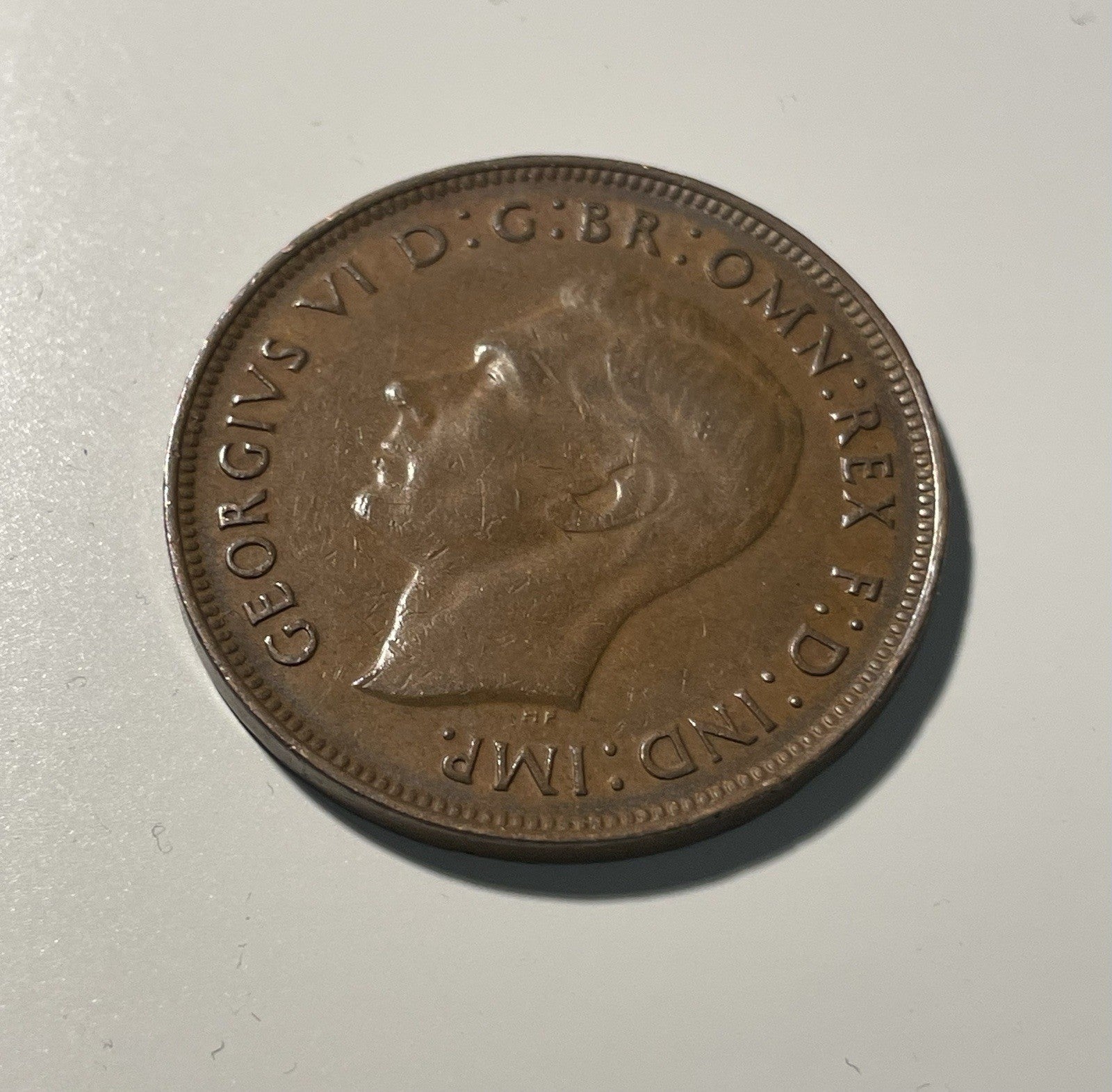 7077842