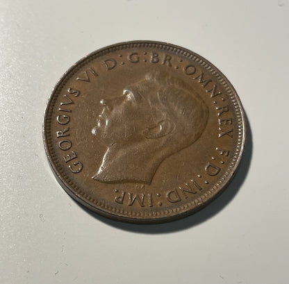 7077842