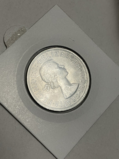 6957756