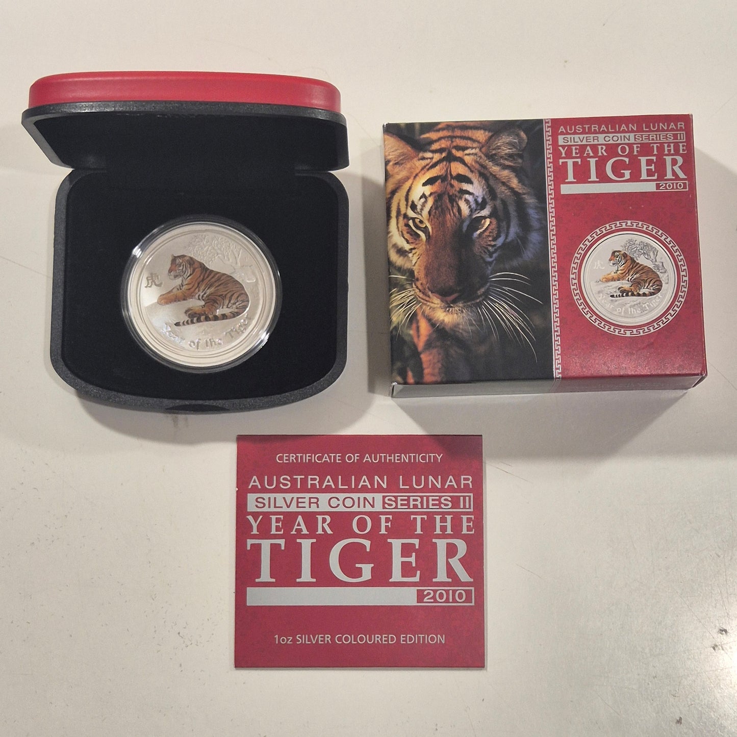2000 Dragon proof 1oz, 2014 Horse coloured proof 1oz, 2010 Tiger coloured 1oz