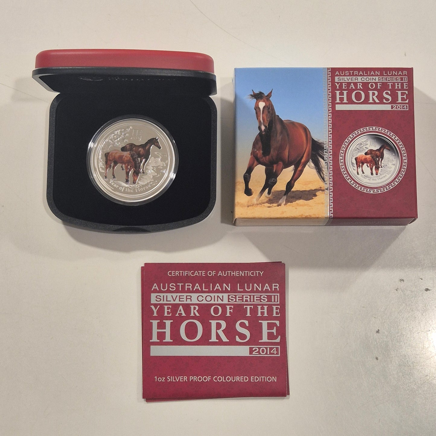 2000 Dragon proof 1oz, 2014 Horse coloured proof 1oz, 2010 Tiger coloured 1oz