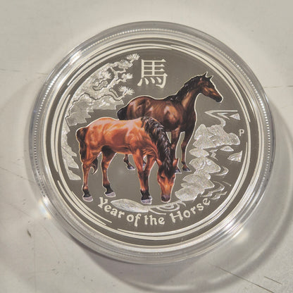 2000 Dragon proof 1oz, 2014 Horse coloured proof 1oz, 2010 Tiger coloured 1oz
