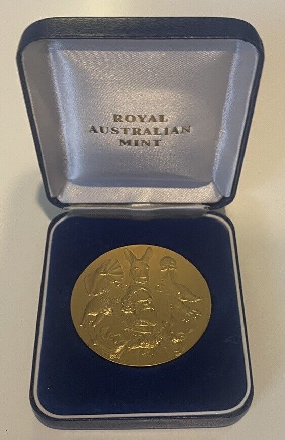 Royal Australian Mint medallion with Aboriginal Elder surrounded by Wildlife